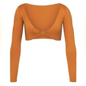 Skims long sleeve shrug.